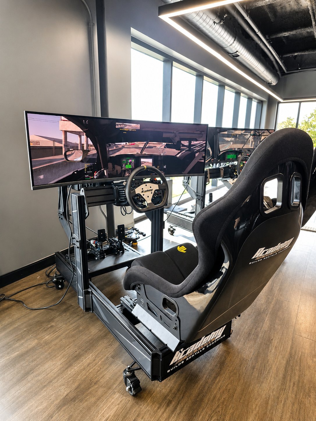 Academy Base simulator build with single 49-inch curved display