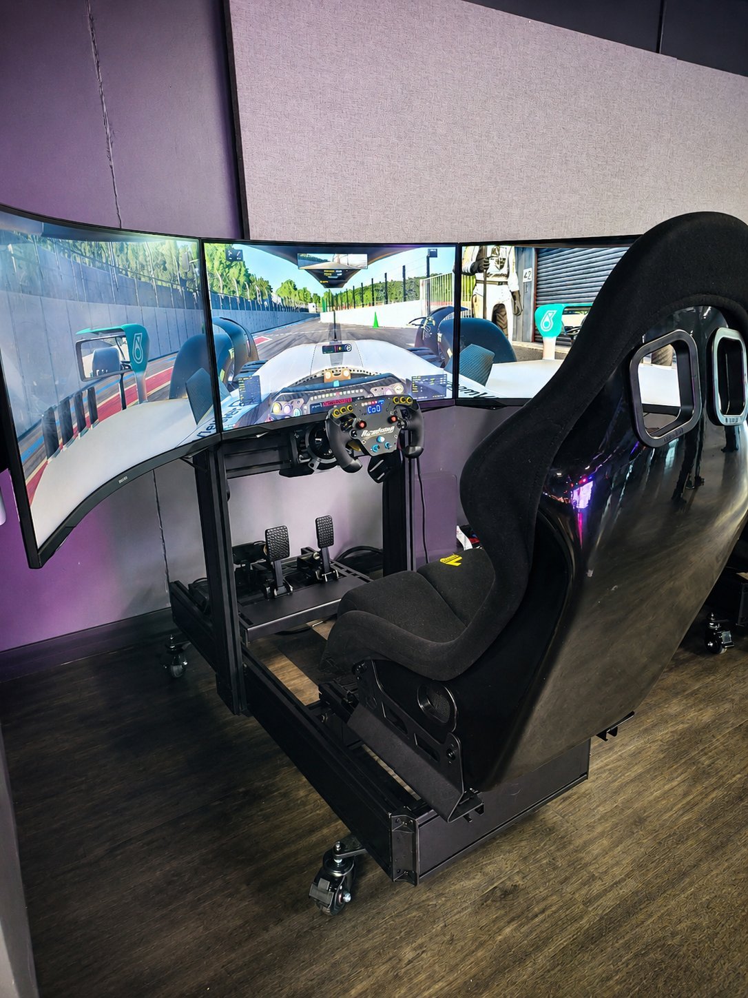 Academy Club Triple simulator build with three curved monitors